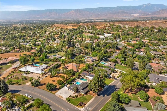 drone / aerial view featuring a mountain view