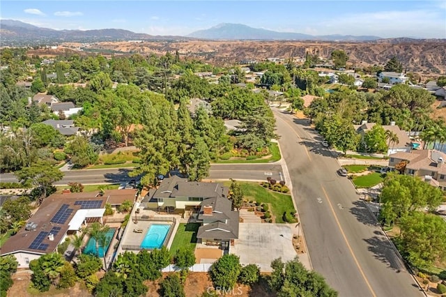 bird's eye view featuring a residential view and a mountain view