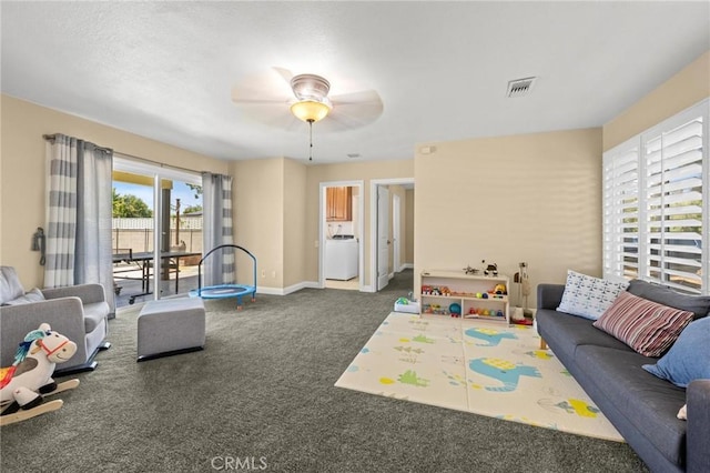 recreation room with visible vents, carpet floors, a ceiling fan, and baseboards