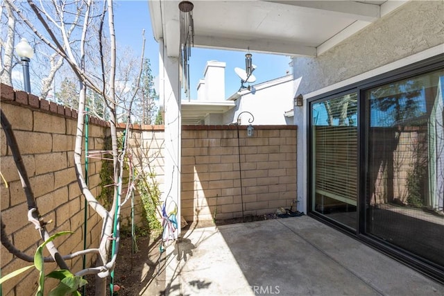 view of patio / terrace with fence