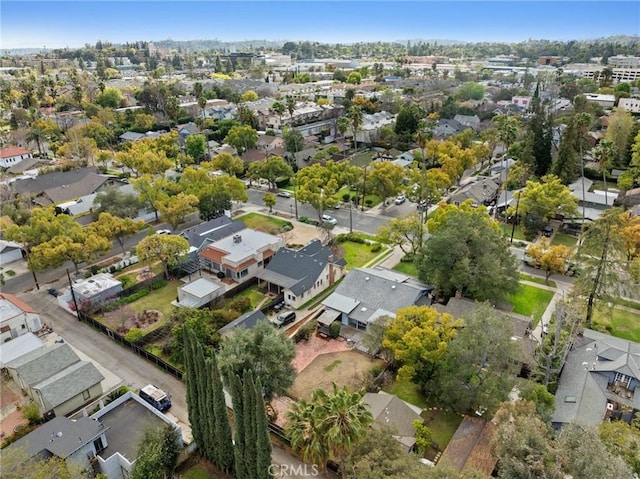 birds eye view of property with a residential view