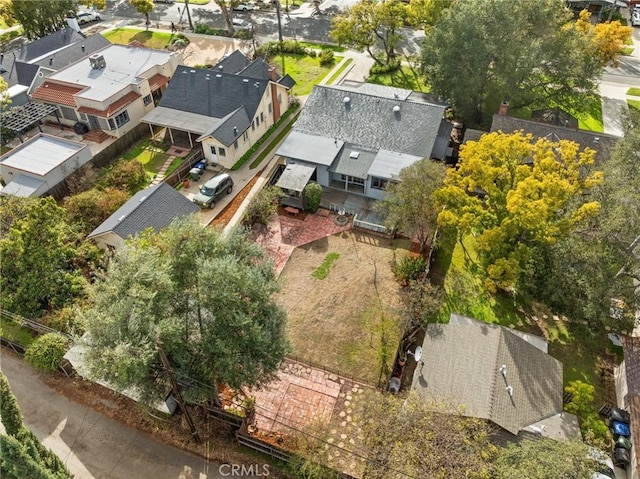 birds eye view of property with a residential view