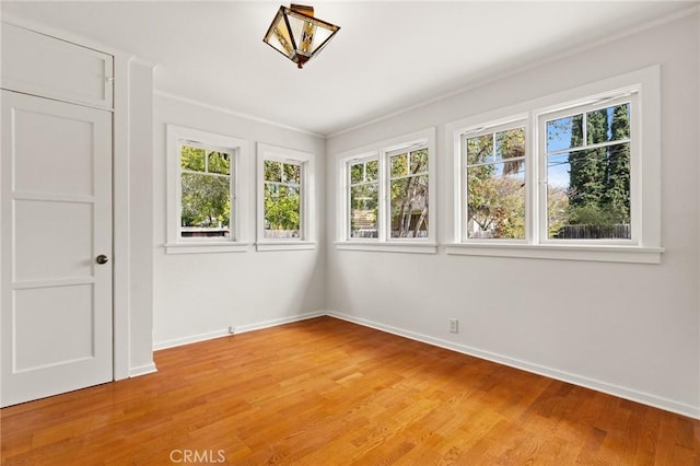 unfurnished sunroom with a healthy amount of sunlight