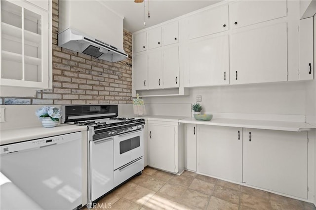 kitchen featuring white appliances, custom exhaust hood, white cabinets, and light countertops