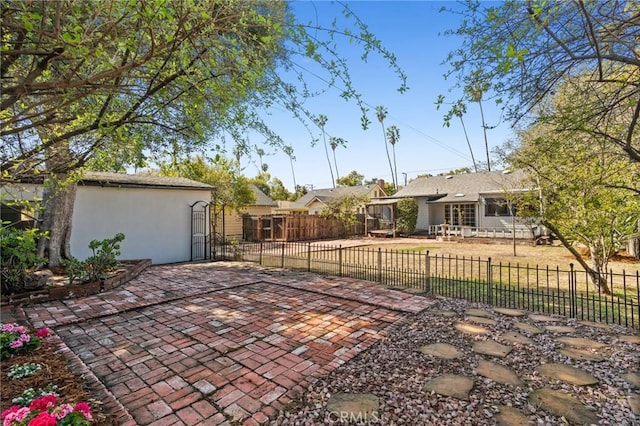 ranch-style home with stucco siding and fence private yard