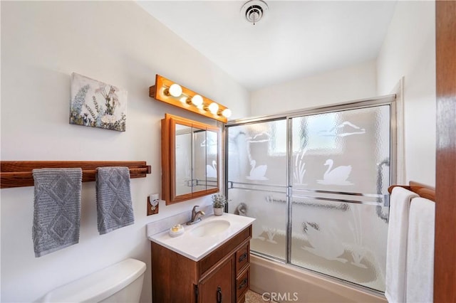 full bath with toilet, shower / bath combination with glass door, visible vents, and vanity