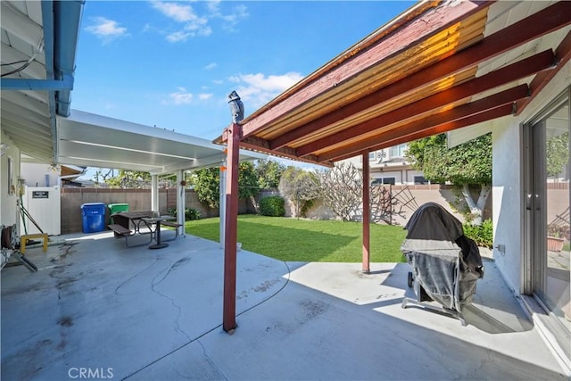 view of patio featuring grilling area and a fenced backyard