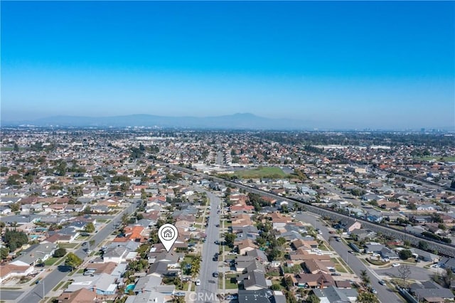 aerial view featuring a mountain view and a residential view