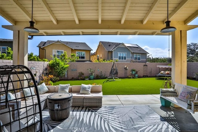 view of patio with outdoor lounge area and a fenced backyard
