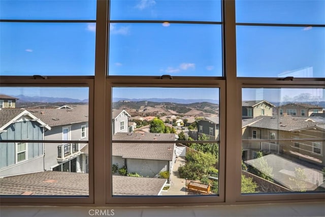 room details with a residential view and a mountain view