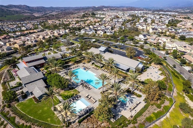 aerial view featuring a mountain view and a residential view