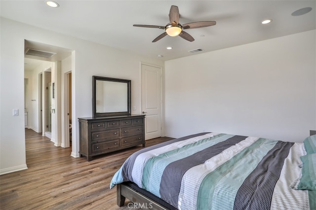 bedroom featuring a ceiling fan, wood finished floors, recessed lighting, and visible vents