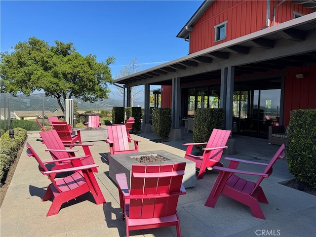 view of patio featuring a fire pit