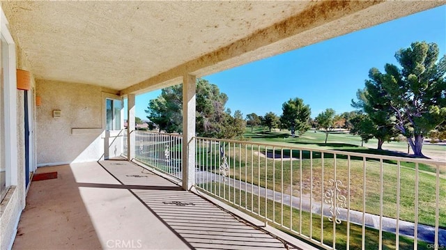 balcony featuring view of golf course