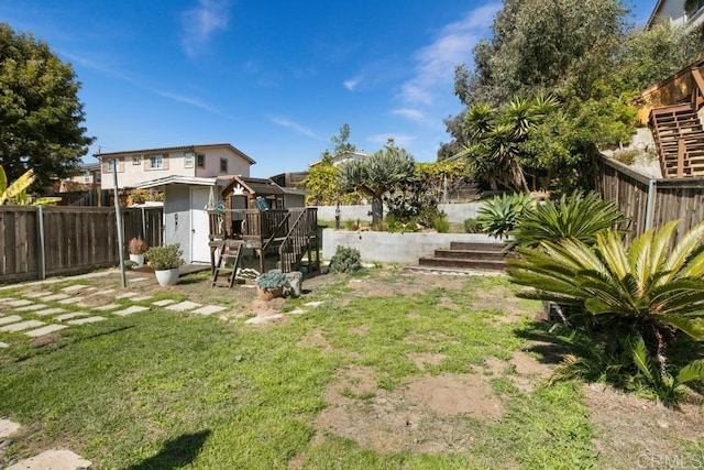 view of yard with a fenced backyard