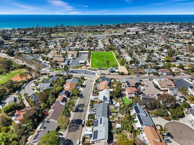 aerial view featuring a residential view and a water view