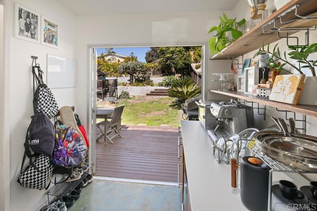 doorway featuring concrete flooring