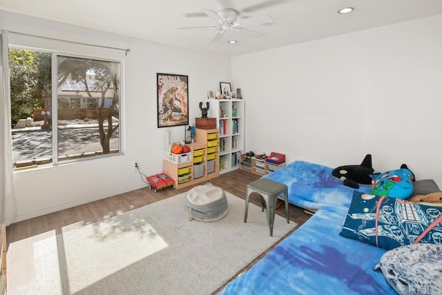 game room featuring a ceiling fan, wood finished floors, and recessed lighting