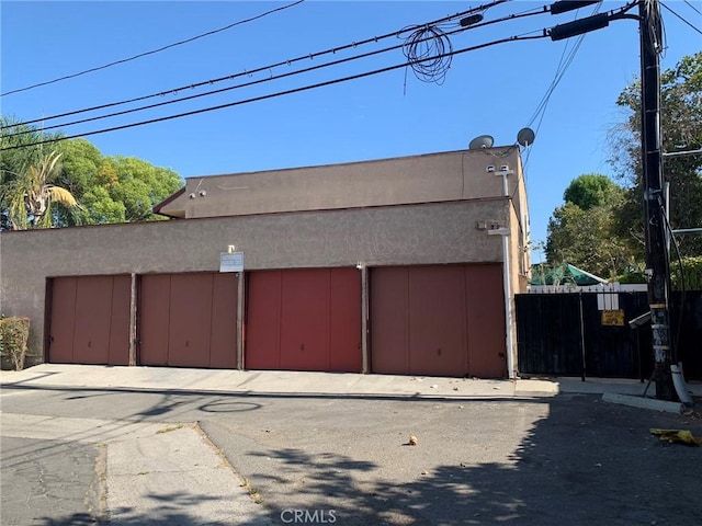 garage with fence