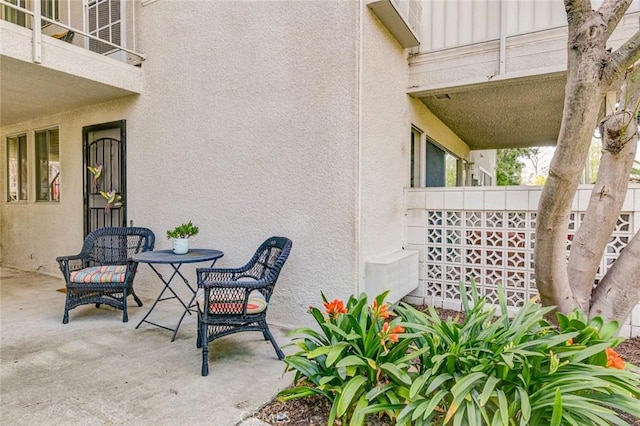 view of patio featuring fence