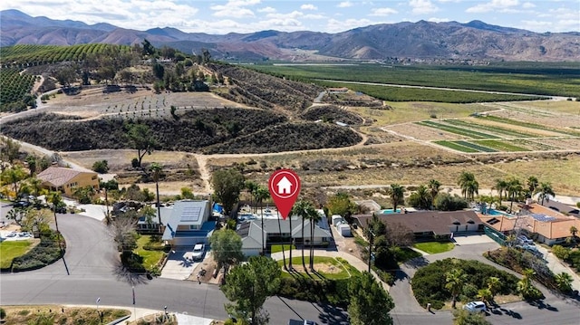 bird's eye view with a rural view and a mountain view