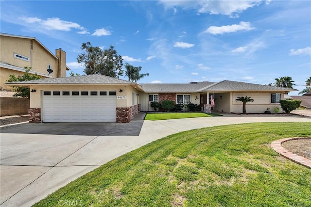 ranch-style house with a garage, a front yard, brick siding, and driveway