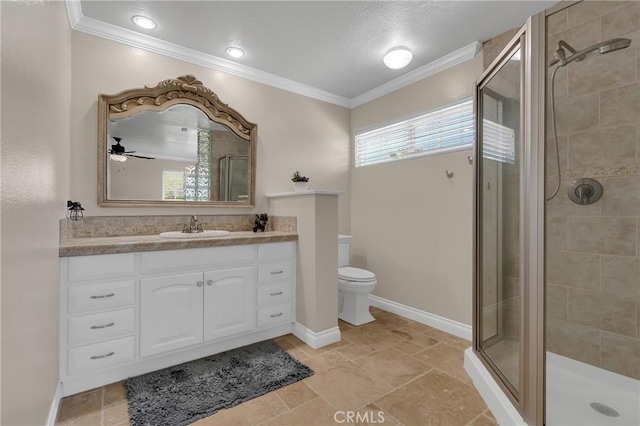 bathroom featuring a stall shower, crown molding, and toilet