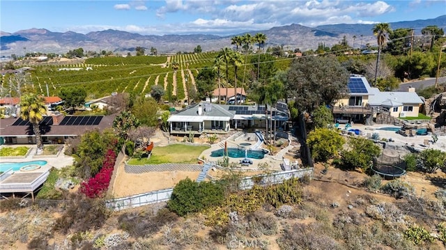 bird's eye view featuring a rural view and a mountain view