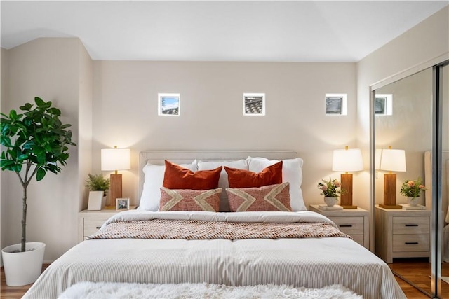 bedroom featuring wood finished floors