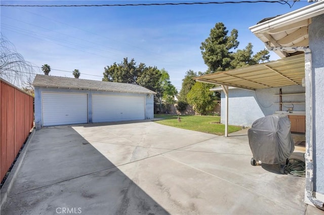 detached garage with fence