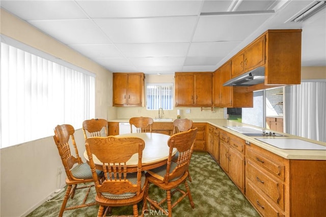 dining area with a paneled ceiling and visible vents