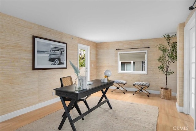 office with wood finished floors and baseboards