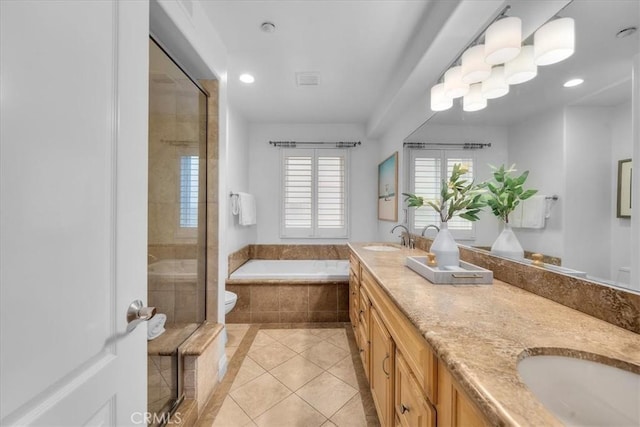 full bath with tile patterned flooring, a stall shower, a bath, and a sink
