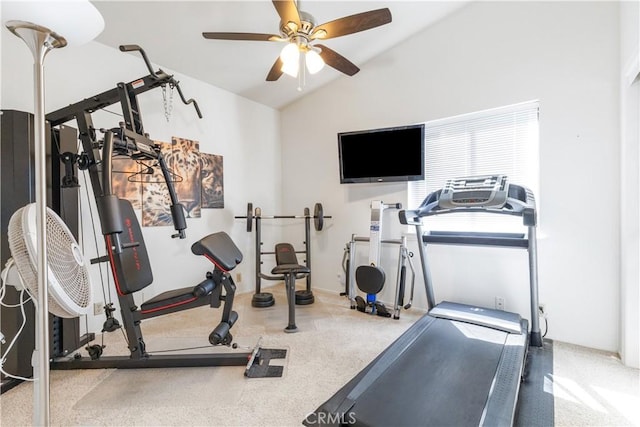 exercise room with lofted ceiling and a ceiling fan