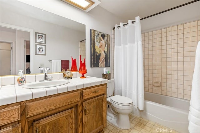 full bathroom with vanity, toilet, and shower / bath combo with shower curtain