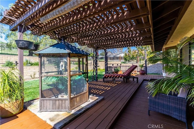 wooden deck with fence and a pergola