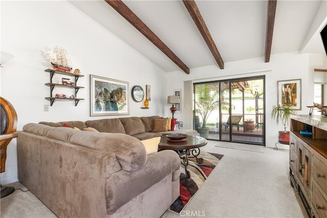 living area featuring light carpet and lofted ceiling with beams