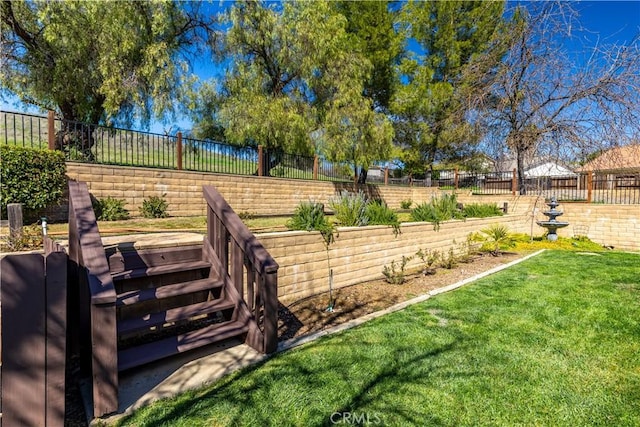 view of yard featuring a fenced backyard