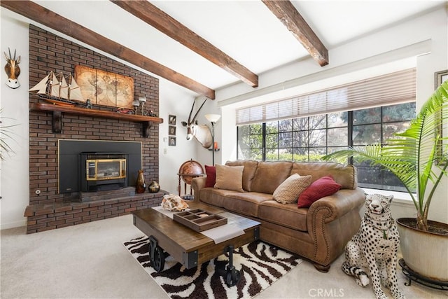 carpeted living room featuring a fireplace and beamed ceiling