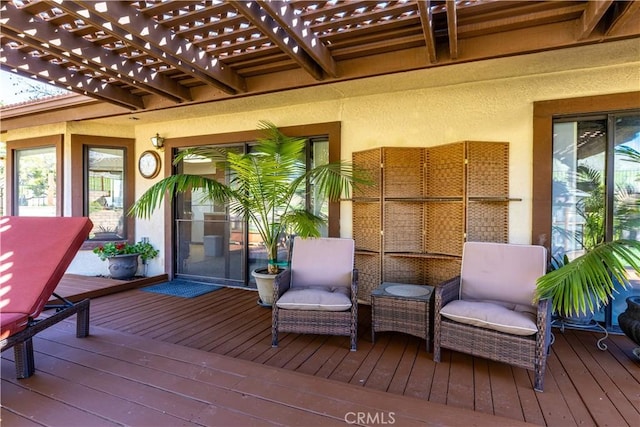 wooden deck with a pergola