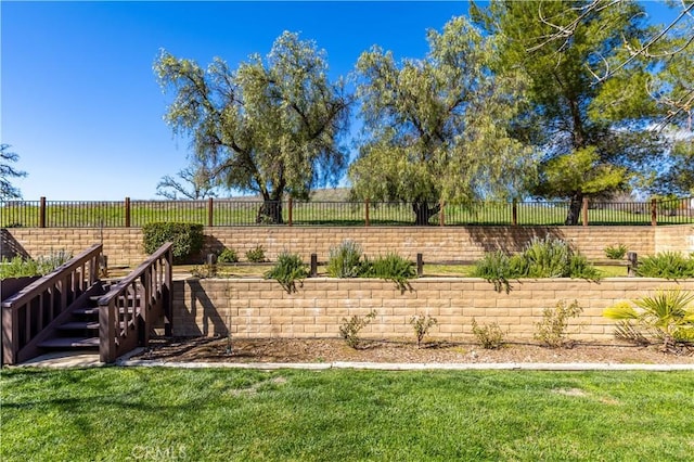 view of yard with a fenced backyard