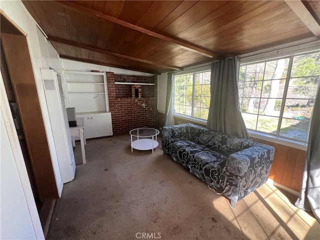 sunroom with vaulted ceiling and wood ceiling