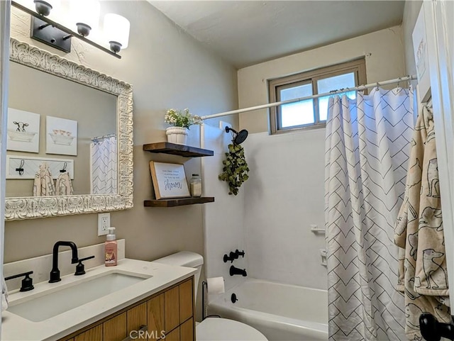 full bathroom featuring toilet, shower / tub combo with curtain, and vanity