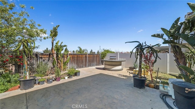 view of patio with a fenced backyard