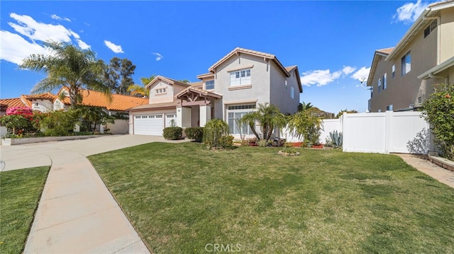 view of front of property featuring driveway, a garage, fence, a front lawn, and stucco siding