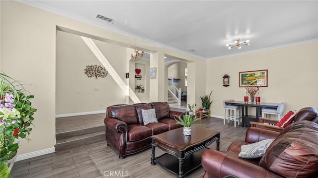 living area with arched walkways, visible vents, wood tiled floor, and stairs