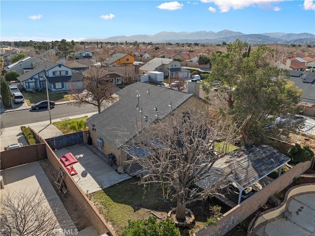 bird's eye view featuring a residential view and a mountain view