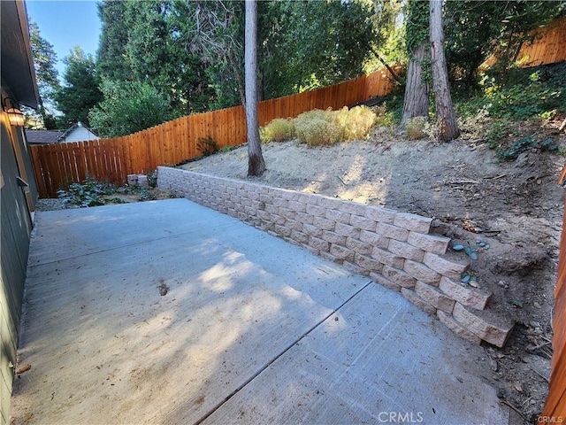 23511 Lake Dr, Crestline, CA 92325 - view of patio / terrace with a fenced backyard