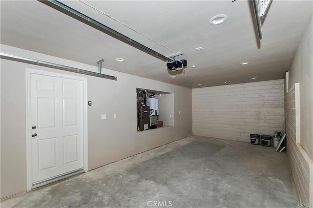 23511 Lake Dr, Crestline, CA 92325 - garage with a garage door opener and recessed lighting