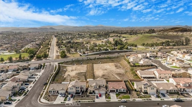 bird's eye view with a residential view and a mountain view